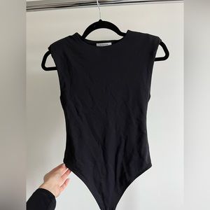 Shoulder padded body suit